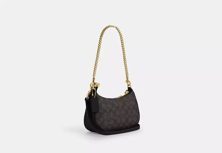 Teri Mini Crossbody Bag In Signature Canvas